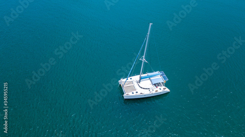 Canvas Print The drone captures a high angle view of catamaran sailboats moored in the Andaman sea