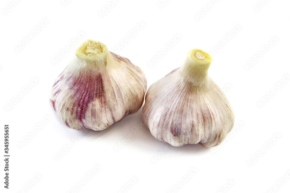 Obraz premium Garlic bulbs on a white background