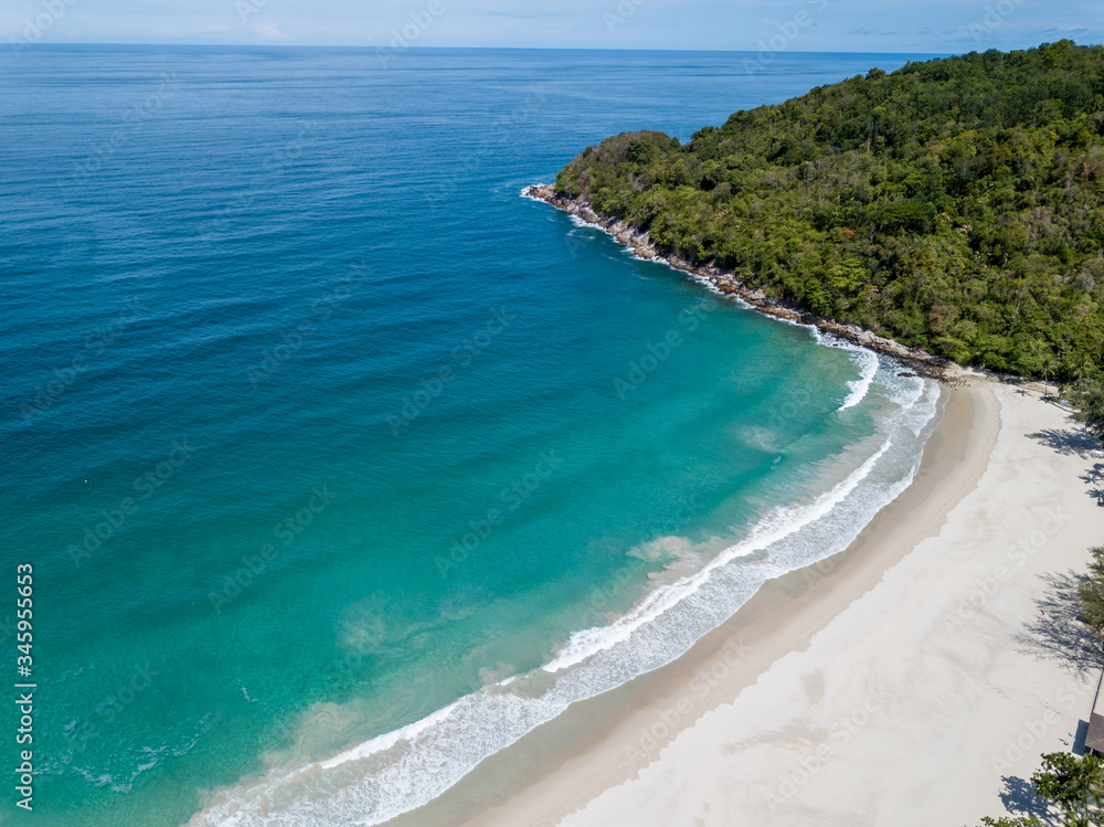 The blue sea and the white sand beach are free from any distractions. Drone photos