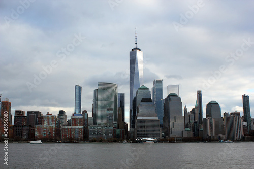 New York  USA - 20 12 2019  One world trade centre Building  observation tower Manhattan New York skyline skyscraper  from ferry approaching downtown city. stock photo