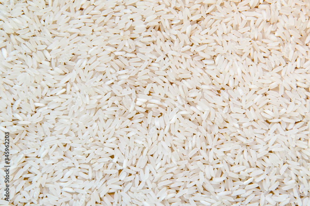 Top view on uncooked white rice. Background Top view on uncooked white rice. Background