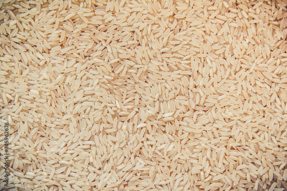 Uncooked white rice background. Top view Uncooked white rice background. Top view