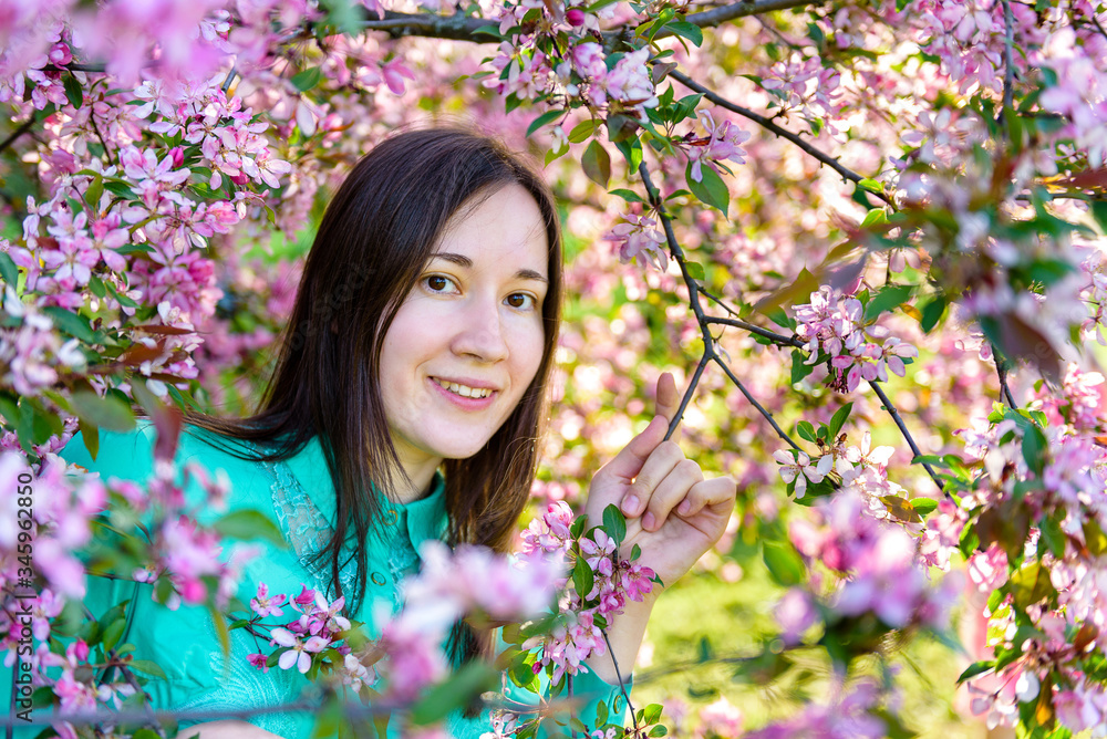 beautiful girl in a blooming tree beautiful girl in a blooming tree