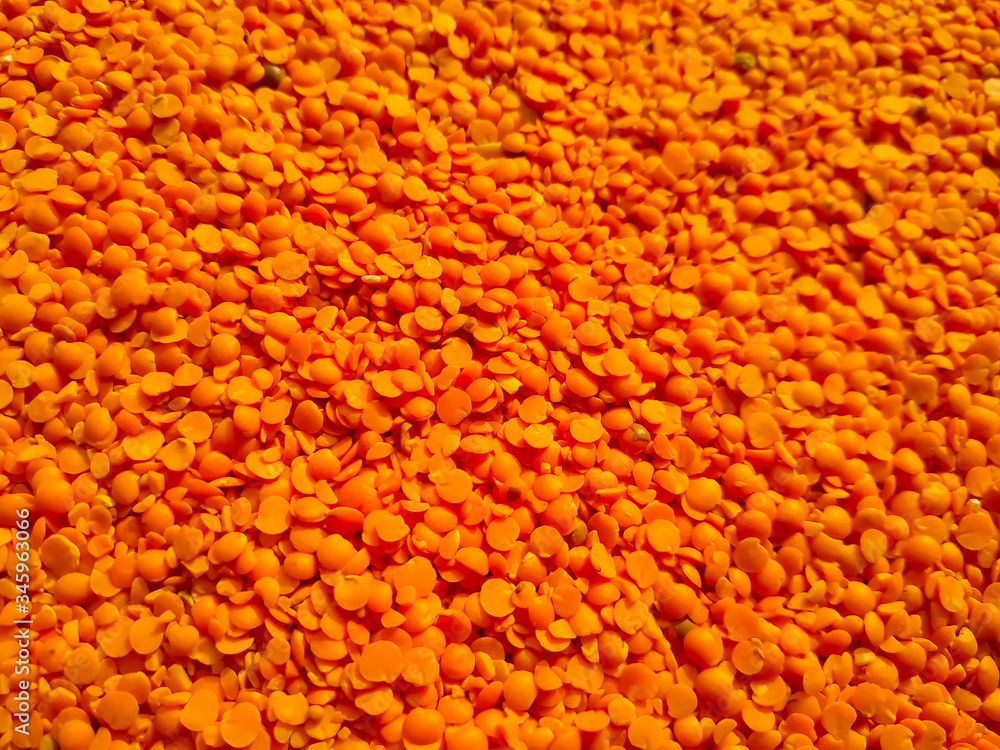 Red raw organic lentils texture. Food ingredient background. Nepal Red raw organic lentils texture. Food ingredient background. Nepal