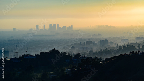 View of downtown Los Angeles, from the Hollywood Hills, at sunset.   © parkerspics