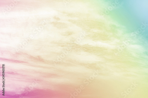 A soft cloud with a pastel colored orange to blue gradient for background