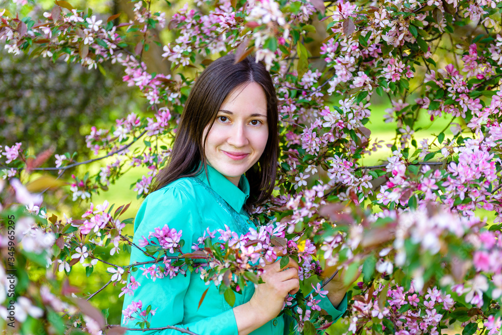 beautiful girl in a blooming tree beautiful girl in a blooming tree