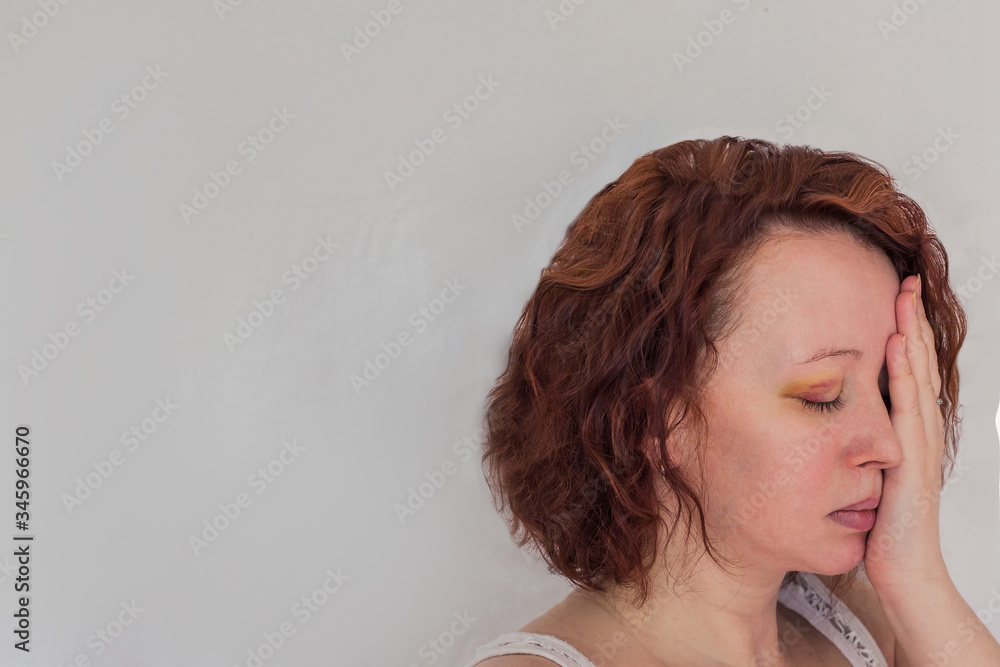 Domestic violence a young woman with a black eye Domestic violence a young woman with a black eye