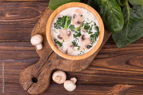 Fresh creamy champignon spinach soup