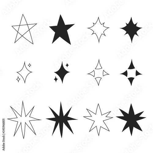 Set of black hand drawn doodle stars isolated on white background. Vector illustration.