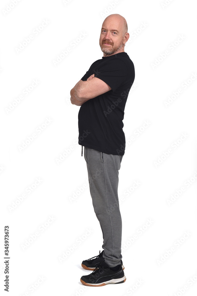 profile man with sportswear and looking at camera, arms crossed profile man with sportswear and looking at camera, arms crossed