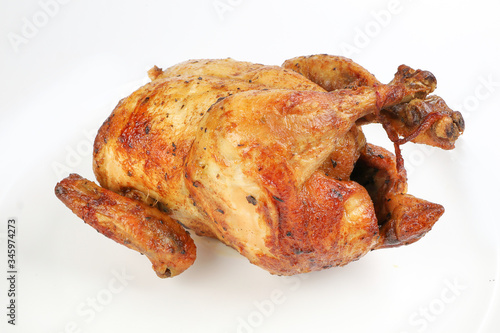 Whole roasted grilled chicken poultry bird on white background