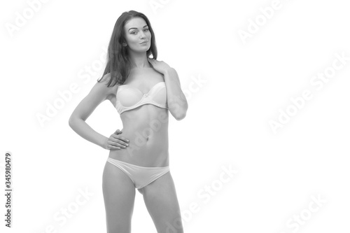 young girl with slender body posing in underwear