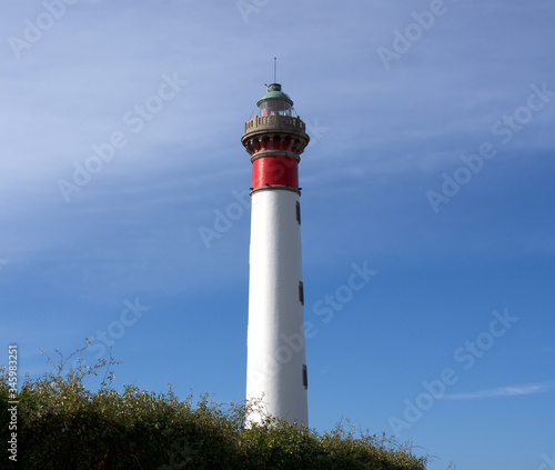 Wallpaper Mural Lighthouse on a background of blue sky, Ouistreham, France Torontodigital.ca