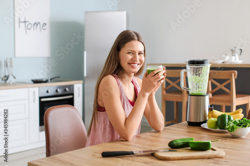 Sporty woman with glass of ...