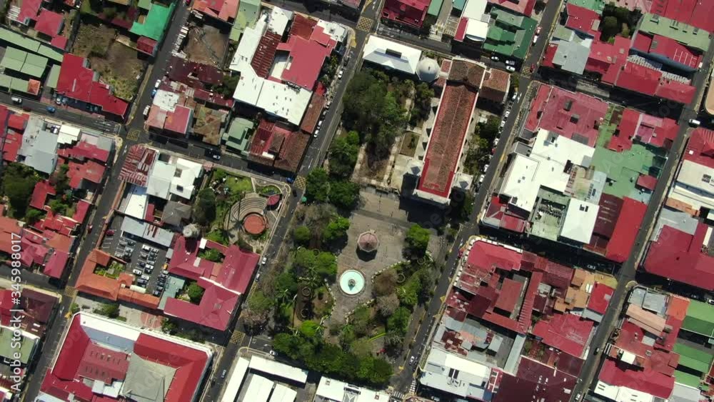Beautiful cinematic aerial view of the empty streets of Heredia City and park in Costa Rica Beautiful cinematic aerial view of the empty streets of Heredia City and park in Costa Rica