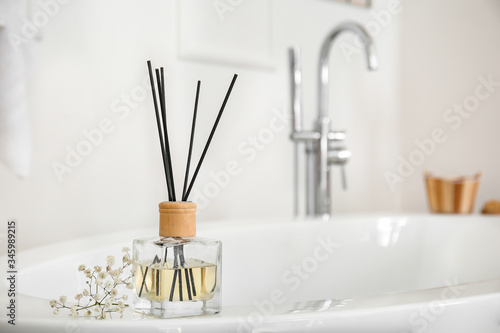 Reed diffuser in modern bathroom photo