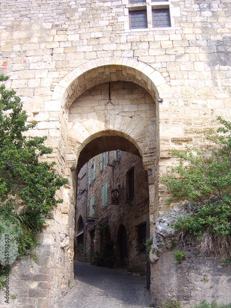 old stone wall and arches, Cordes sur ciel, France