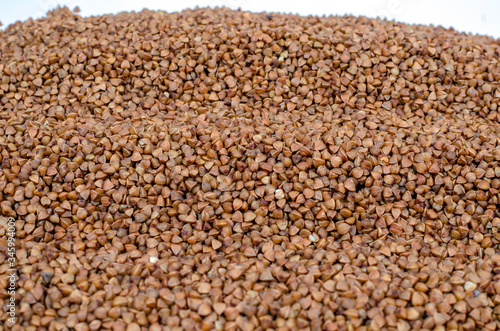 peeled buckwheat grain closeup with place for an inscription