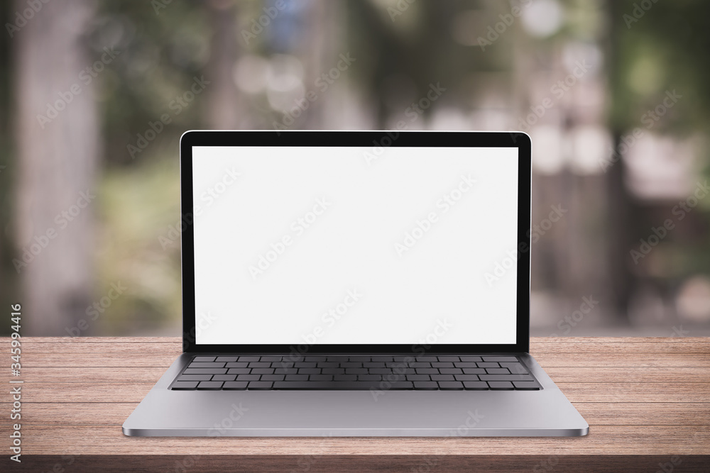 Blank screen laptop computer on wood table top with coffee shop bokeh background, 3D rendering Blank screen laptop computer on wood table top with coffee shop bokeh background, 3D rendering
