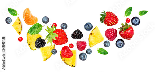 Fototapeta Naklejka Na Ścianę i Meble -  Creative layout made of summer fruits and mixed berries isolated on white background. Flat lay. Food concept..