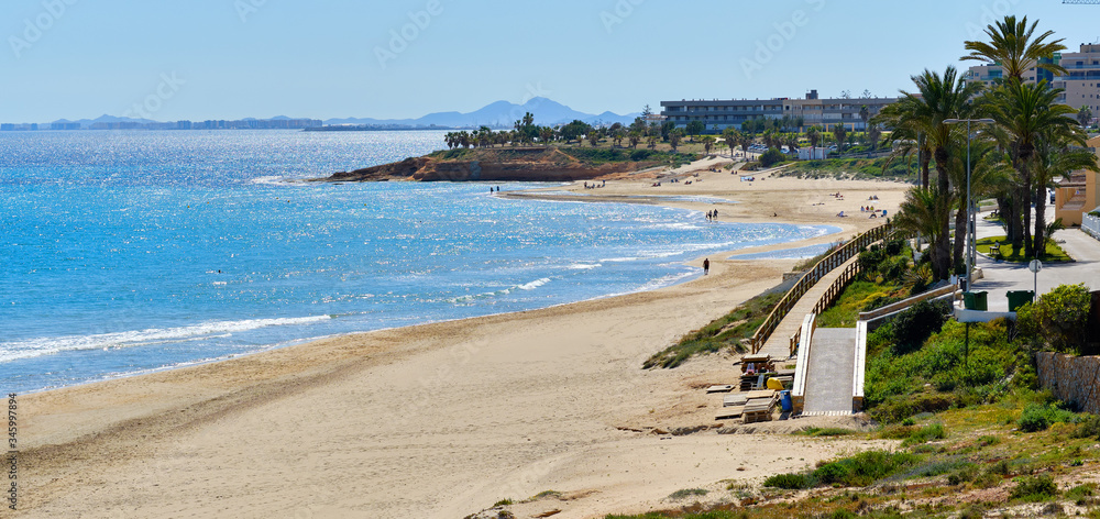 Panoramic image Mil Palmeras Costa Blanca beach. Spain