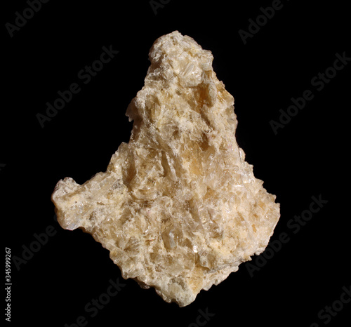 Mica sample isolated on black background. Natural Mineral Rock Specimen - mica stone. Mineral of volcanic origin