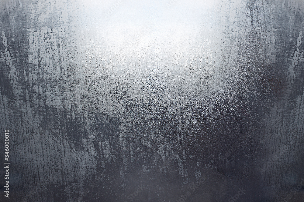 Obraz premium Rain drops on glass. Ecology, climate change, bad weather. Background image.