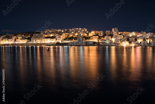 Night photo of Saint Paul's Bay Xemxija Malta  © Chawran