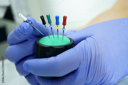 An endodontist doctor works with a verifier. Professional in his field.