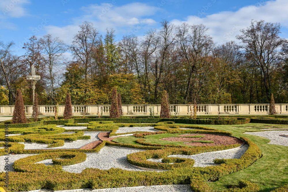 Beautiful green garden in the park at Wilanow district.