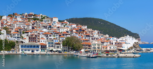 Beautiful panoramic summer view of old town and harbor of Skopelos Island, Northern Sporades islands, Greece