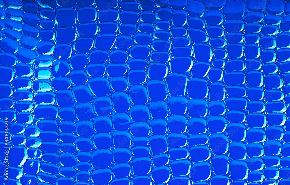 Naklejka premium Crocodile leather pattern for background. Light blue.