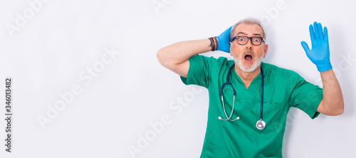 doctor with expression of surprise or amazement isolated on white background