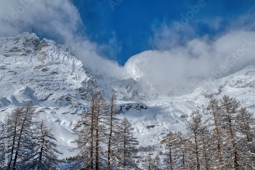 View Italian Alps and Matterhorn Peak under the clouds in December, Breuil-Cervinia, Valle d'Aosta, Italy  © Yamagiwa