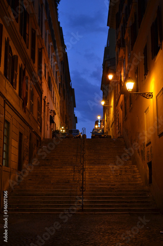 Dark mysterious street at late dusk  Rome  Italy