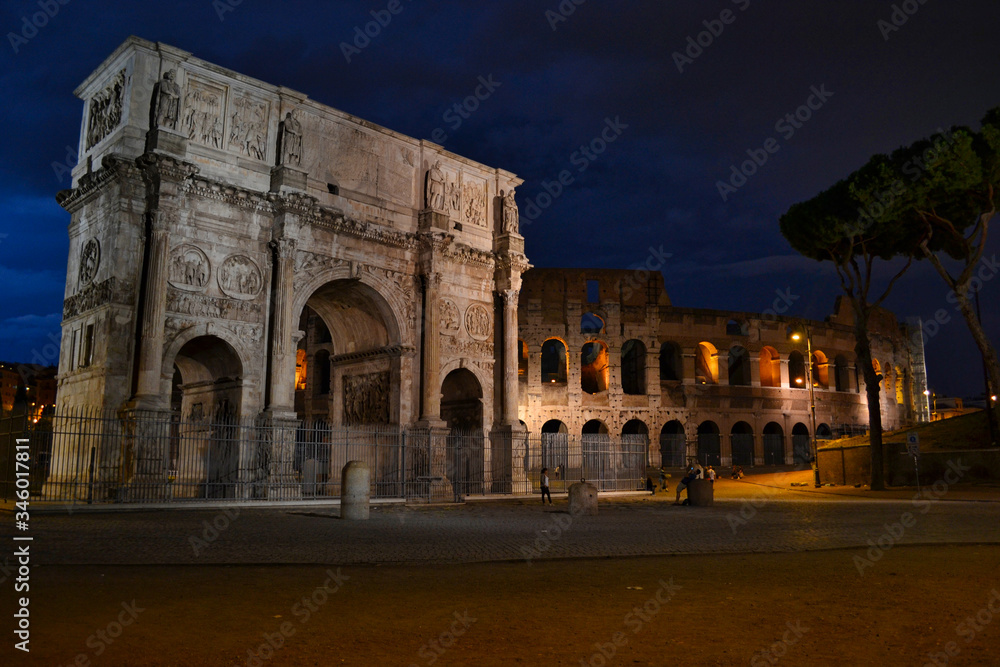 Triumphal Arch just before the storm, Coliseum in the background, Rome, Italy