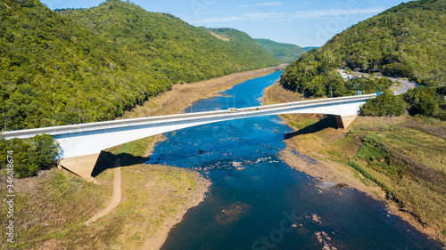 Pelotas river bridge, in Vacaria - RS. Aerial view of Pelotas River and ruins of the old bridge during the 2020 drought photo