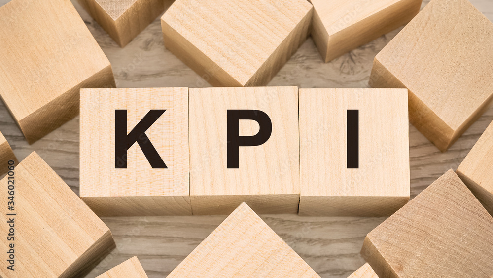 Key Performance Indicator KPI acronym word lettering typography design on wooden blocks Stock