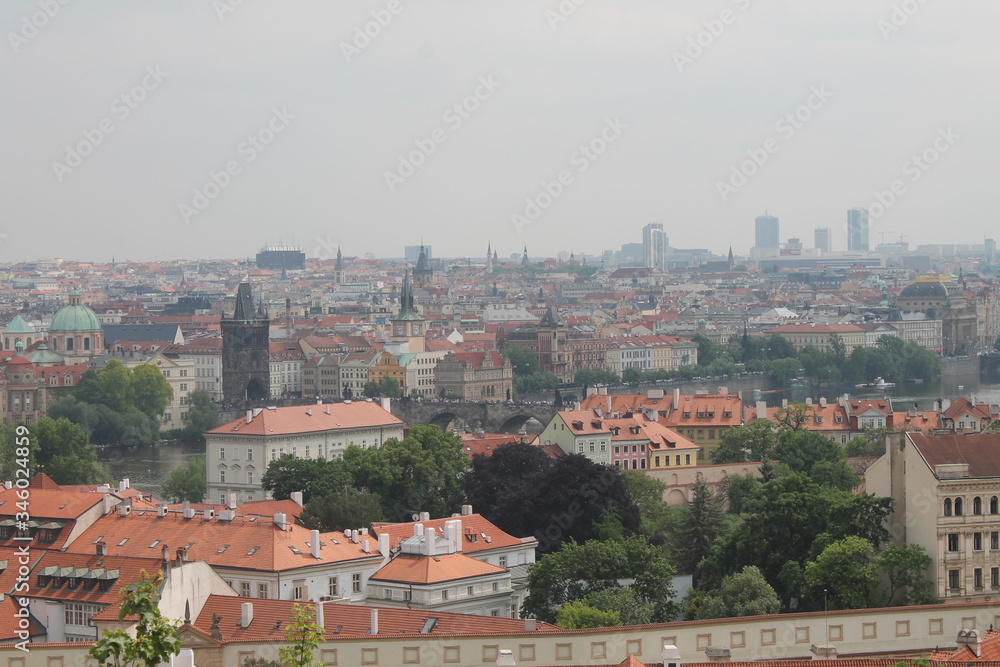 view from the top of the mountain to the town with red-tiled roofs of Prague Czech Republic Europe