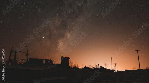 Night photography of the ruins of epecuen, the stars light up the sky near the carhue town, Provincia de Buenos Aire, Argentina. photo