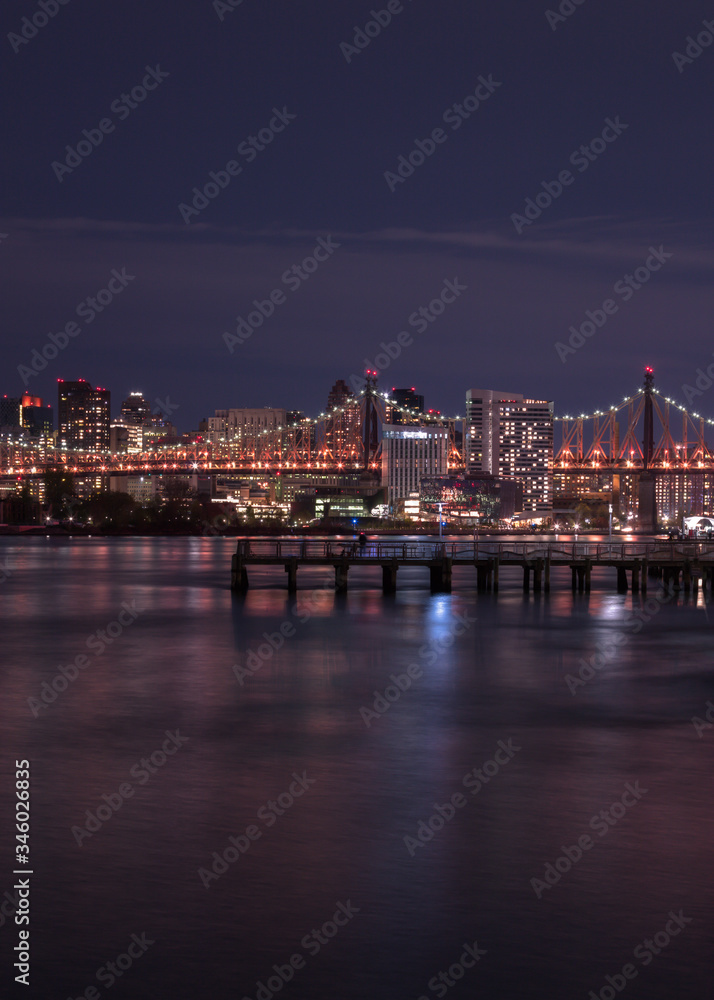 View on the pier and Queensboro bridge at night with long exposure
