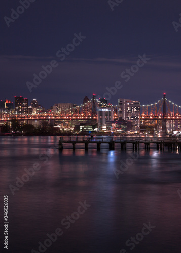 View on the pier and Queensboro bridge at night with long exposure