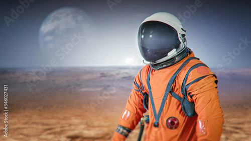 Expedition on Mars planet. Spaceman on red planet. Astronaut in suit on surface. Elements of this image furnished by NASA © dimazel