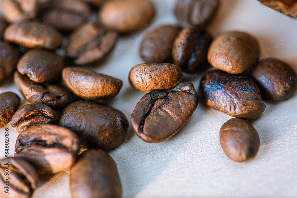 coffee beans isolated on a white background, scattered, close-up coffee beans isolated on a white background, scattered, close-up