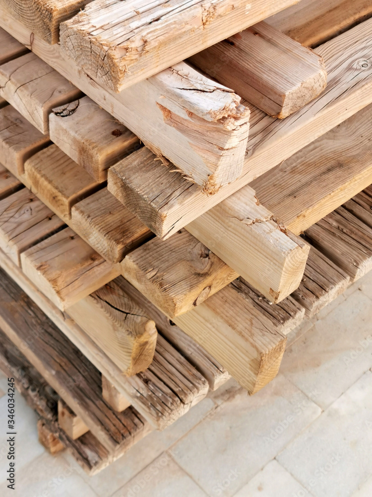 
wooden pallets are stacked ready for transport