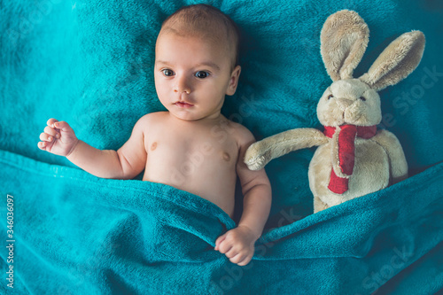 Baby asleep with stuffed animal