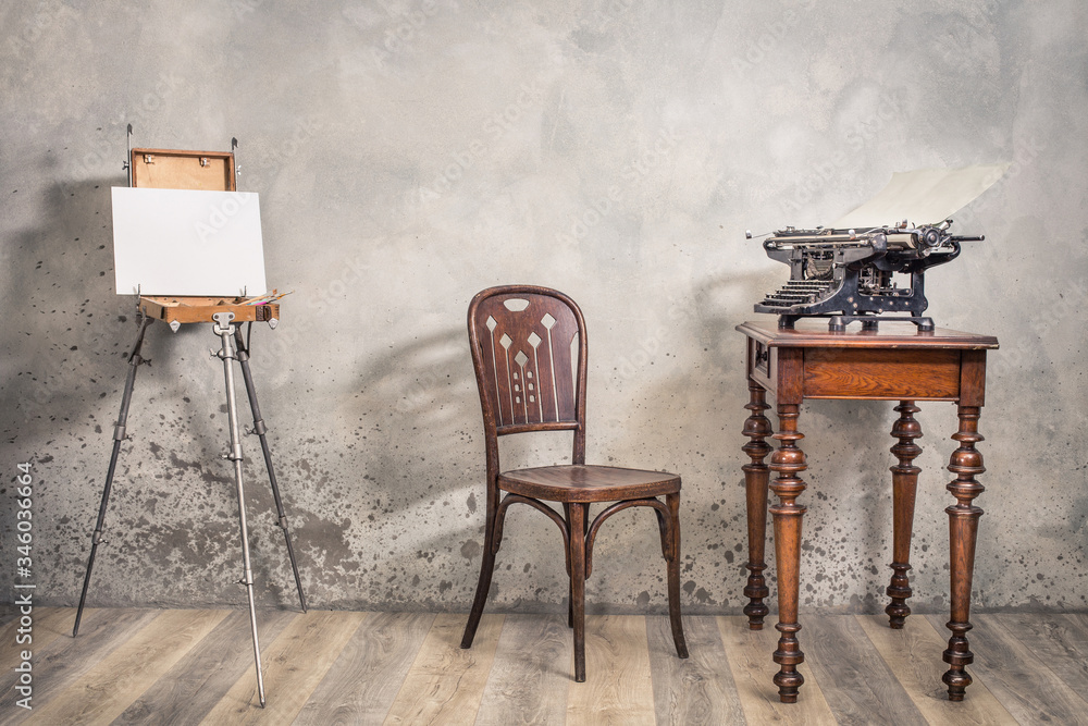 Vintage Typewriter With Sheet Of Paper On Old Oak Desk Easel Painting  Canvas Blank Aged Chair Front Grunge Concrete Wall Background Artists  Classic Workplace Concept Retro Style Filtered Photo Stock Photo 