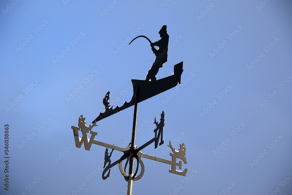 vane with fisherman and fishes vane with fisherman and fishes