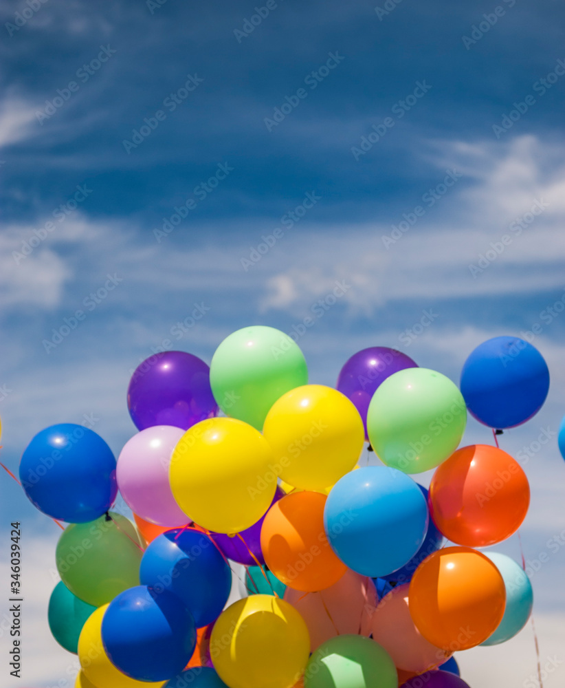 Bunch of colorful balloons outside on a sunny day Bunch of colorful balloons outside on a sunny day